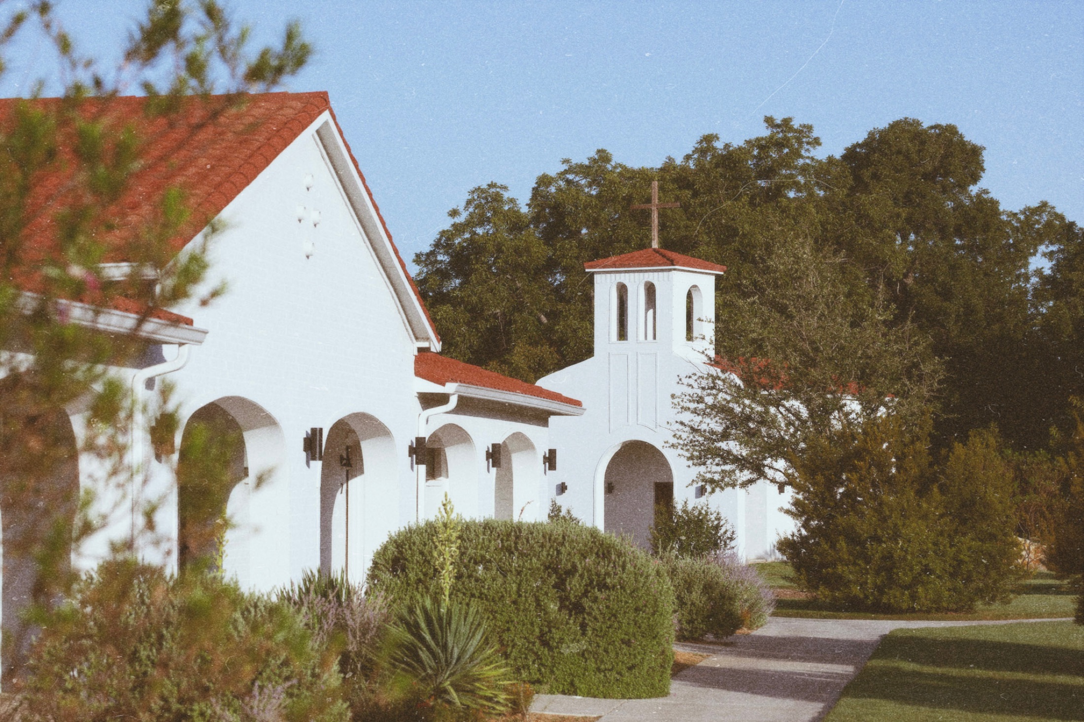 Arched casitas and the chapel bell tower at La Palmilla