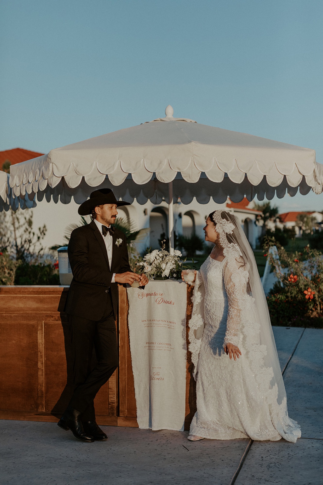 Bride and groom at golden hour at La Palmilla, a Spanish wedding venue near DFW